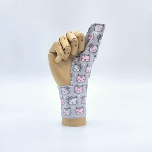 Custom made thumb sucking guards, cover, glove.  Thumb sucking help.  Thumb Hugger for adults and children.