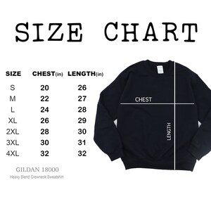 May include: Size chart for a Gildan 18000 heavy blend crewneck sweatshirt. The chart shows chest and length measurements in inches for sizes S through 4XL.