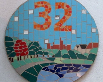 Decorative house number in mosaics; mosaic house sign/plaque; variety of sizes, colours and themes available, eg the view from the house!