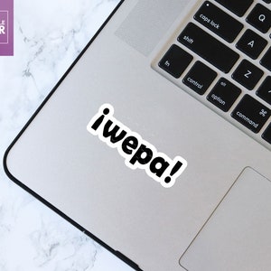 May include: A black and white sticker with the text "iwepa!" on a silver laptop.