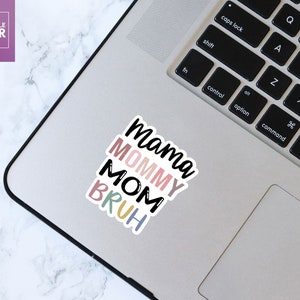 May include: A sticker with the words "mama", "mommy", "mom", and "bruh" in different colors. The words are stacked on top of each other, with "mama" at the top and "bruh" at the bottom.