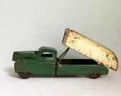 Charming Buddy L toy dump truck in forest green and creamy yellow rusty patina great farmhouse christmas decor with ornaments or greenss