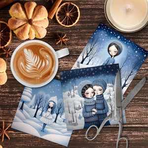 May include: Three winter-themed greeting cards featuring illustrations of girls in snowy landscapes. The cards are decorated with snowflakes and stars. The cards are on a wooden surface with a cup of coffee, cinnamon sticks, and other winter decorations.
