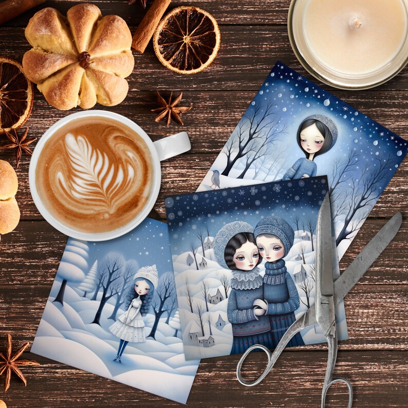 May include: Three winter-themed greeting cards featuring illustrations of girls in snowy landscapes. The cards are decorated with snowflakes and stars. The cards are on a wooden surface with a cup of coffee, cinnamon sticks, and other winter decorations.