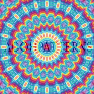 May include: A colorful, abstract, circular pattern with a kaleidoscope design. The pattern is made up of concentric circles of red, orange, yellow, green, blue, and purple. The center of the pattern is a bright white circle.
