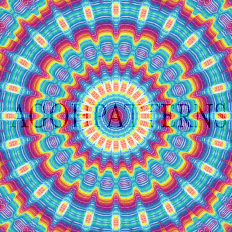 May include: A colorful, abstract, circular pattern with a kaleidoscope design. The pattern is made up of concentric circles of red, orange, yellow, green, blue, and purple. The center of the pattern is a bright white circle.