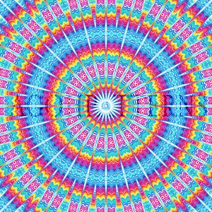 May include: A colorful circular pattern with concentric rings of red, orange, yellow, green, blue, and purple. The center of the pattern is a white starburst.