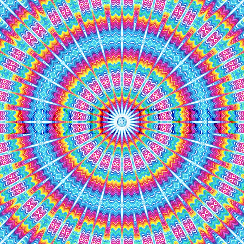 May include: A colorful circular pattern with concentric rings of red, orange, yellow, green, blue, and purple. The center of the pattern is a white starburst.