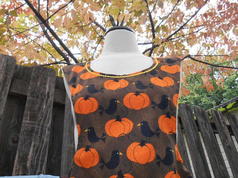 the Polly Womens Fall Apron Pumpkins Crows Black and White Polka Dot Over the Head