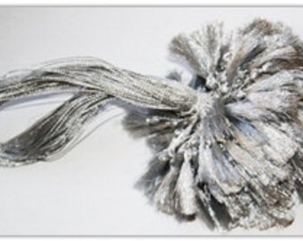 Silver thread with tassel