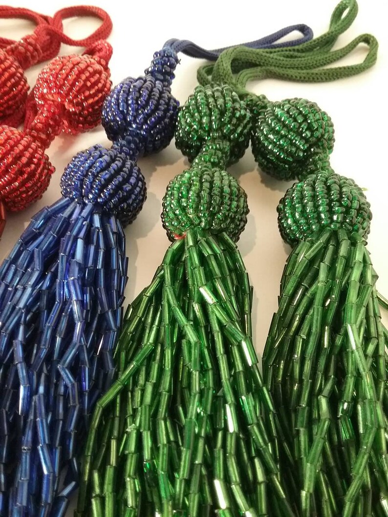 red tassel. Glass beaded blue green