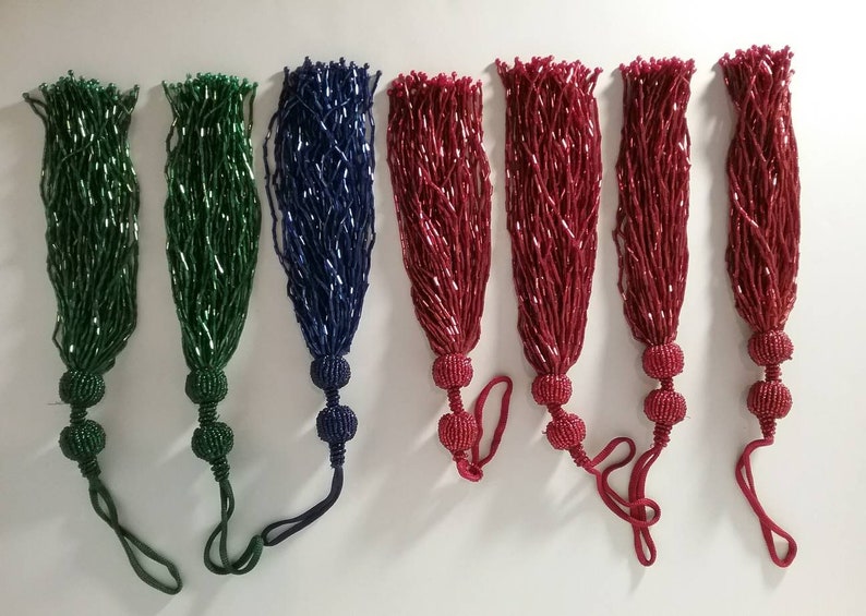 red tassel. Glass beaded blue green