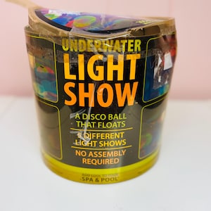 May include: A set of three ceramic mugs with a speckled, matte finish. The mugs are in shades of cream, light gray, and dark gray. Each mug has a simple, modern design and a rounded handle.