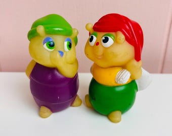 Lote de 2 marionetas de dedo de gusanos luminosos Playskool que brillan en la oscuridad.