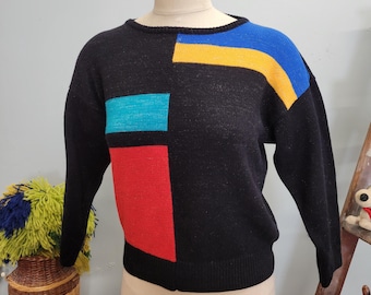 Suéter vintage de lúrex con bloques de color de los años 80: top retro vintage de punto metalizado con cuadrados geométricos
