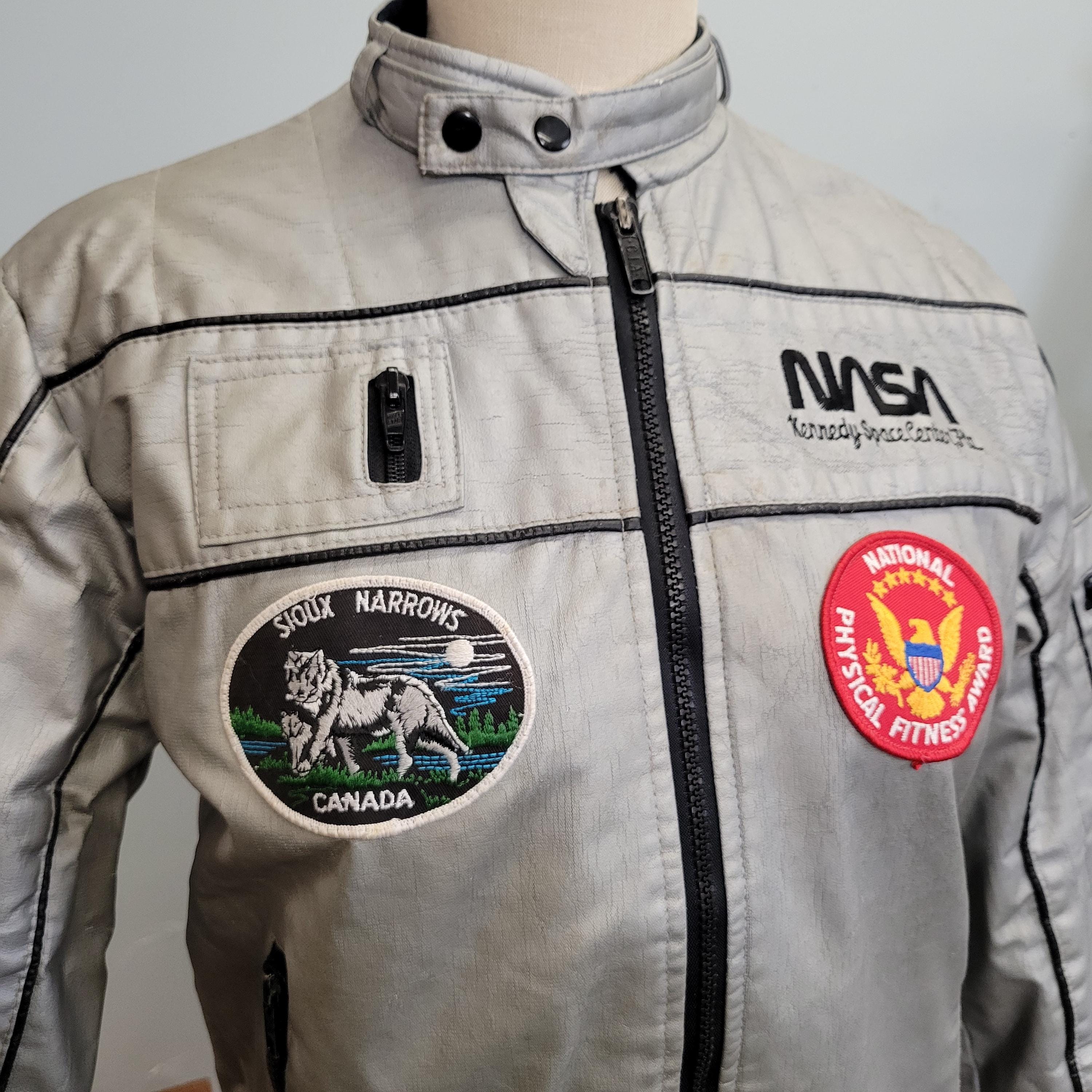 80年代ヴィンテージNASAジャケット：シルバーCIAブランド、ユースL