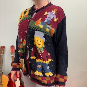 vtg 80s SEASONS KNIT CARDIGAN // vintage hand knit autumn fall harvest scene halloween patterned soft sweater happy face eagles eye style