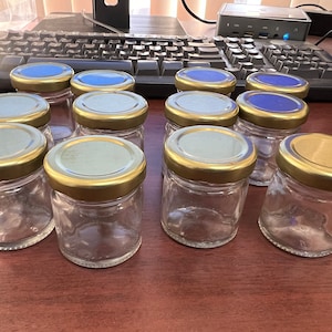 12 Pieces Mini Clear Glass Mason Jars with Screw-top Lids Wedding Favors 1 oz