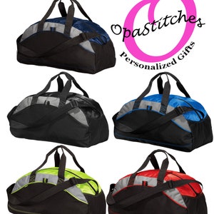 May include: Five duffel bags in different colours with black accents. The bags have a single strap and two handles. The bags are all the same size and shape.