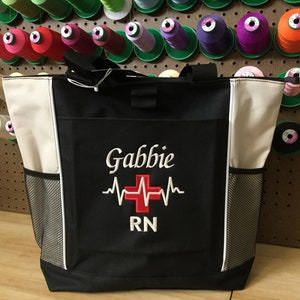 Personalized Deluxe Nursing Tote – Embroidered Name & Title, Adjustable Handles, Large Front Pocket, 12 Unique Designs, Perfect Nursing Gift