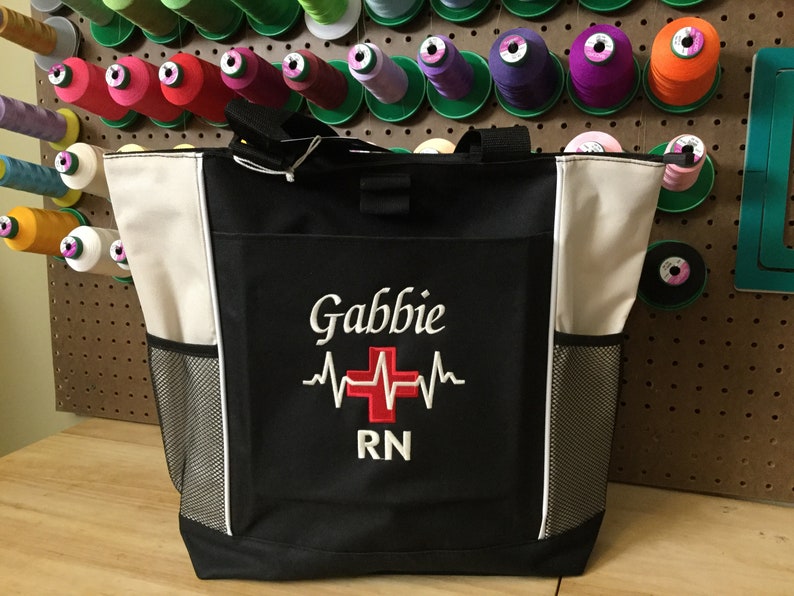 Personalized Deluxe Nursing Tote – Embroidered Name & Title, Adjustable Handles, Large Front Pocket, 12 Unique Designs, Perfect Nursing Gift