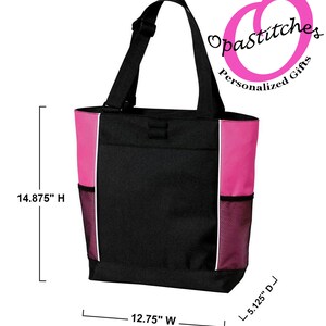 May include: Black and pink tote bag with a white trim, measuring 14.875 inches high, 12.75 inches wide, and 5.125 inches deep. Features a black shoulder strap, side mesh pockets, and the text "Opastitches Personalized Gifts".