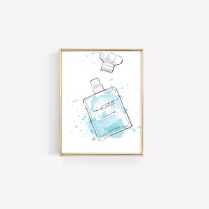 May include: A watercolor illustration of a perfume bottle with a blue liquid and the text "eau de toilette" on the label. The bottle is surrounded by blue watercolor splatters.