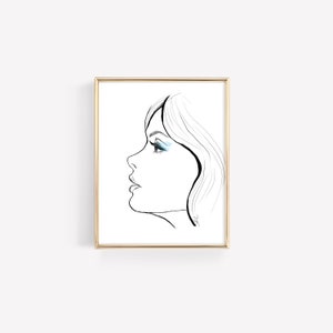 May include: A black and white line drawing of a woman's face with blue eyeshadow. The woman is looking to the side and her hair is long and flowing.