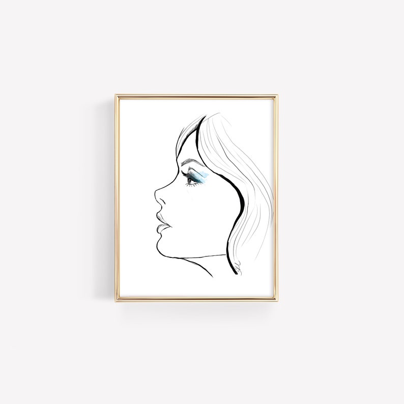 May include: A black and white line drawing of a woman's face with blue eyeshadow. The woman is looking to the side and her hair is long and flowing.