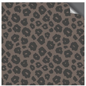 May include: A seamless pattern featuring a brown background with black leopard print spots.