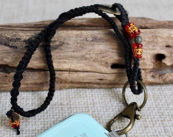 Wrist lanyard with black macrame hemp, jade, glass beads and Chinese luck coins