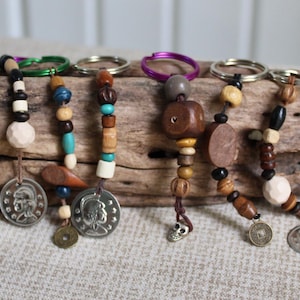 Mini Pirate Keychains: Eco-friendly party favors, pixie dusting gifts in metal, wood, hemp