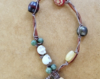 Pirate dread bead accessory made with genuine deerskin, gemstones, skull beads