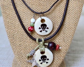 Pirate necklaces with bone pendants, leather cord, sparrow charm, jade, glass and wood beads