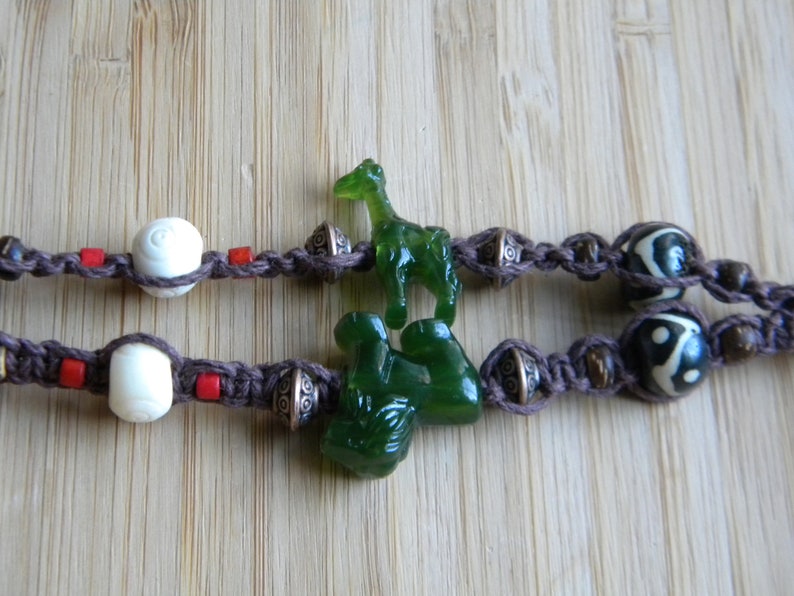 bone Macrame Lanyard in dark brown hemp with polished wood bronze and animal-shaped beads jade