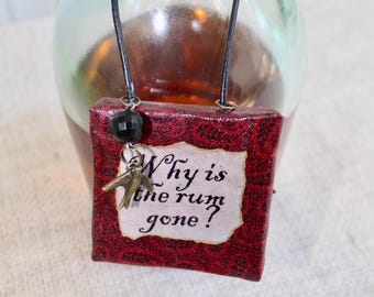 Tag with Pirates of the Caribbean quotes, beads, charms