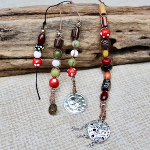 Mini bead strands inspired by Jack Sparrow's dreadlocks with Chinese coin charm, silver charm, hemp, jade, wood and acrylic beads