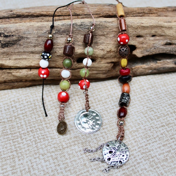 Mini bead strands inspired by Jack Sparrow's dreadlocks with Chinese coin charm, silver charm, hemp, jade, wood and acrylic beads