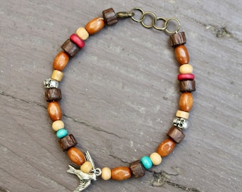 Jack Sparrow Bracelet: Wood Beads, Silver Sparrow Charm