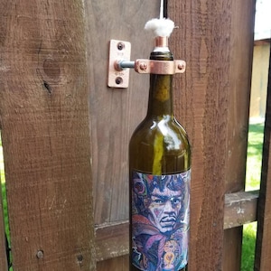 Mounting hardware for wine bottle patio torches
