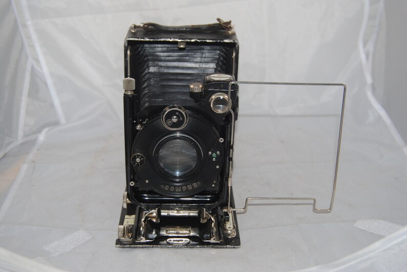 Vintage COMPUR bellows camera w 4 backing film plates.
