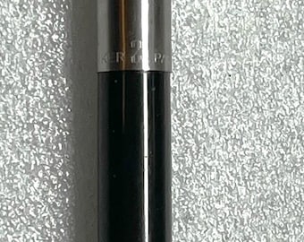 May include: A black and silver Parker fountain pen with a silver arrow on the cap.