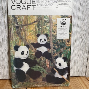 May include: Vogue Craft pattern featuring panda bear plushies. The pattern cover shows three panda bears in a bamboo forest setting. The WWF logo is visible, indicating a portion of the sale benefits the World Wildlife Fund.