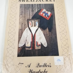 May include: A pattern for a sweatjacket from "A Quilter's Wardrobe" is shown. The image displays two sweatjackets, one light gray and one navy blue, both with quilted details. The text "SWEATJACKET" is at the top.