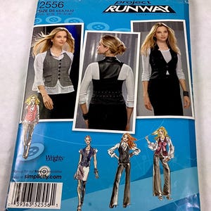 May include: A blue Simplicity sewing pattern for Project Runway, size D5, A, 6, 8, 10, 12. The pattern features images of vests and pants. The front of the pattern has the Project Runway logo and images of the finished garments.