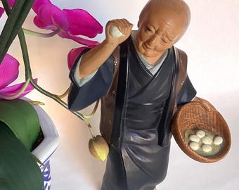 Japanese Hakata Urasaki Clay Figurine Old Woman Inspecting Egg