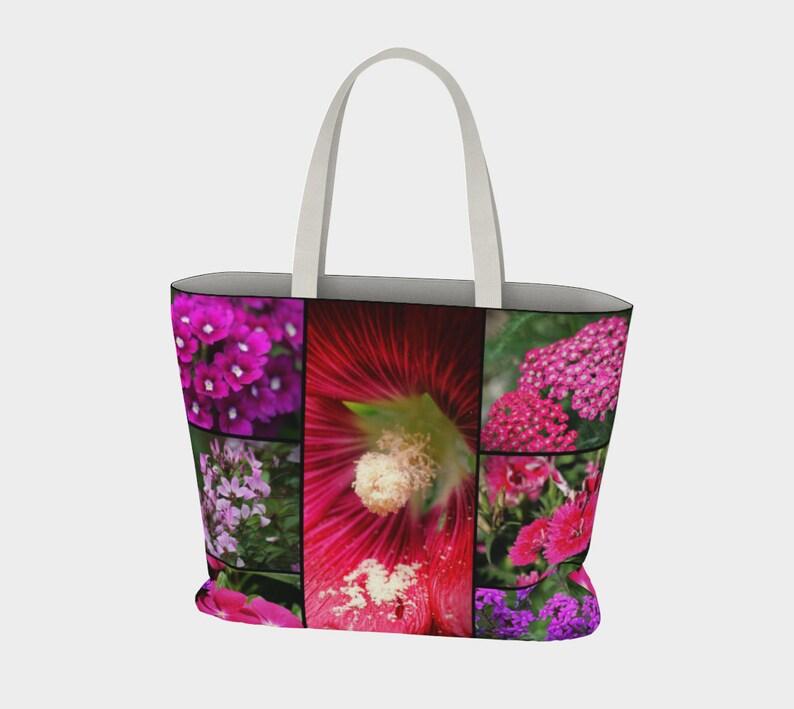May include: A white tote bag with a collage of pink, purple, and red flowers printed on the front.