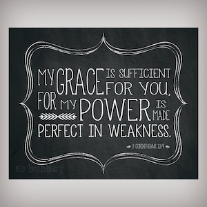 May include: Black and white chalkboard with a white decorative frame and the text "My grace is sufficient for you, for my power is made perfect in weakness. 2 Corinthians 12:9".