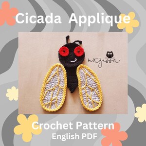 May include: Crochet pattern for a cicada applique. The pattern is in English and is available as a PDF download. The cicada is black with red eyes and yellow and gray wings.