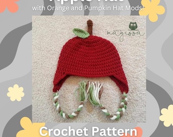 May include: A red crocheted apple hat with a green leaf and brown stem. The hat has braided earflaps with green and white accents. The text "Apple Hat" and "Crochet Pattern English PDF" are displayed.